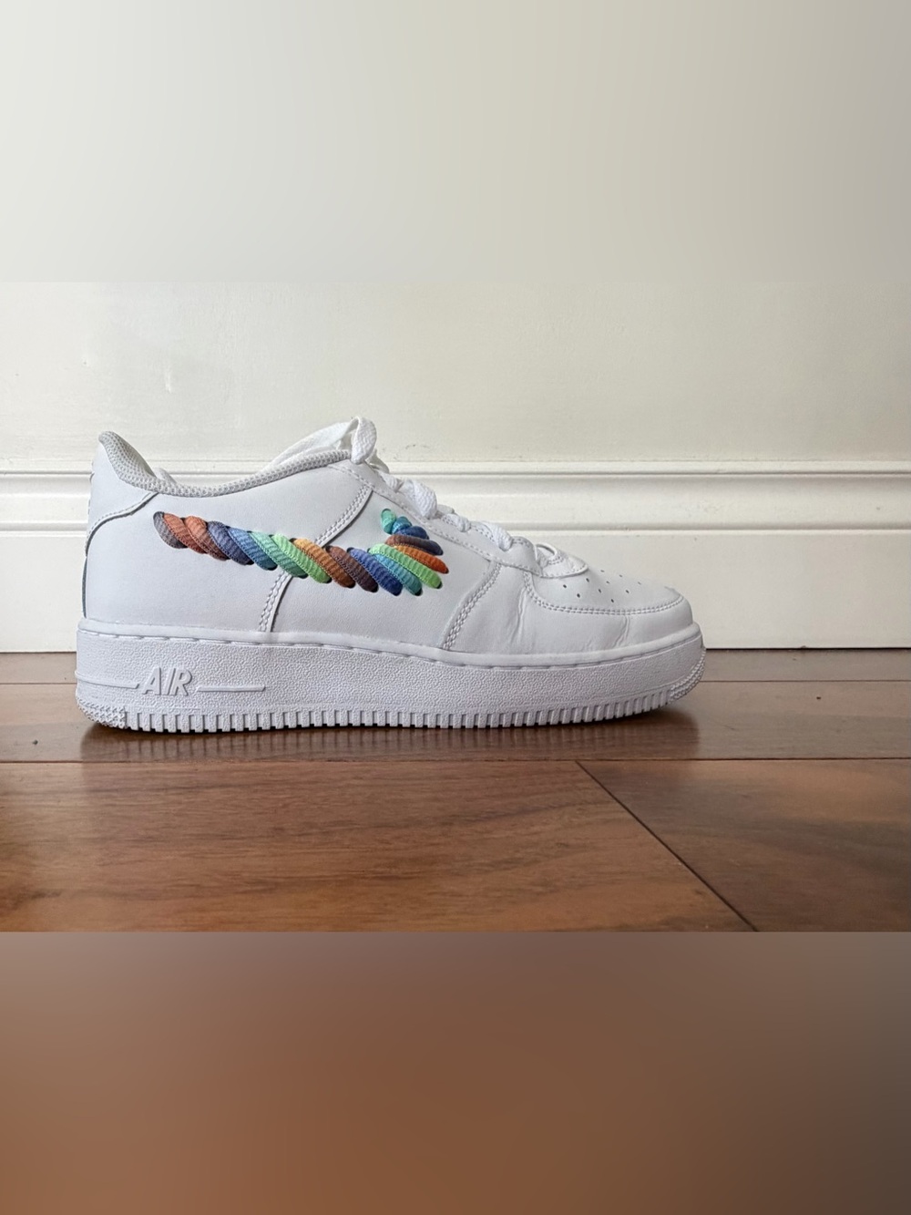 Nike Kids White Sneakers with Rainbow Embroidered Swoosh